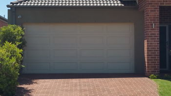 Enhancing Curb Appeal: Transforming Your Home with a New Garage Door